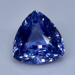 Natural purple trillion-cut sapphire shown from the side