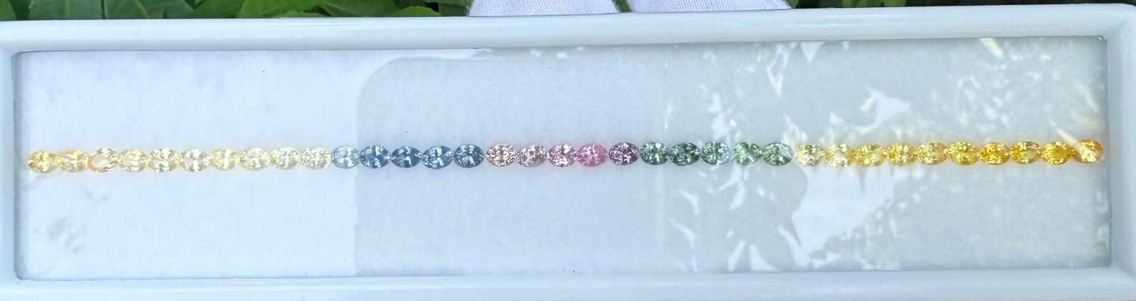 Natural Rainbow Sapphire Layout 7.35 Carat Ceylon Oval Cut VVS Loose Sapphire Set for Bespoke Jewelry - Sapphirepal