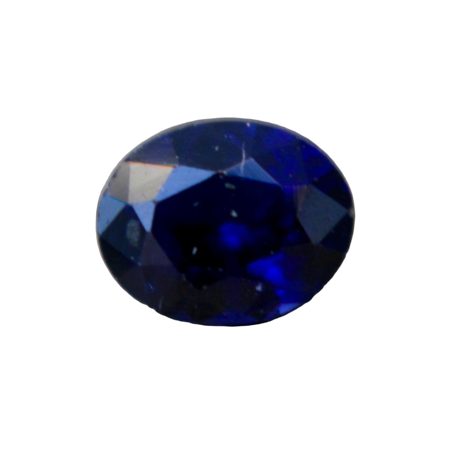 Ceylon royal blue sapphire oval 4.80x3.93 mm — loupe view