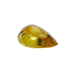 Pear-shaped vivid yellow sapphire showing bright golden hue and fine facets