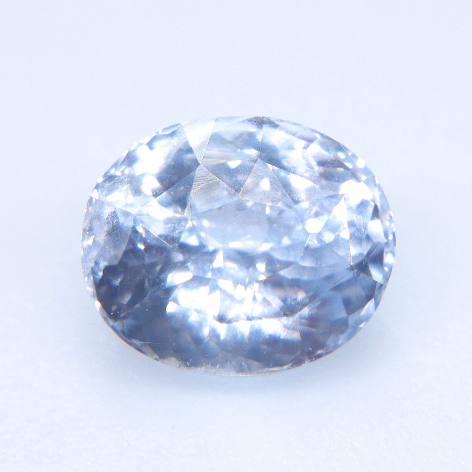 Natural White Sapphire with Blue Hue 1.06 Carat Oval Cut – Ceylon - Sapphirepal