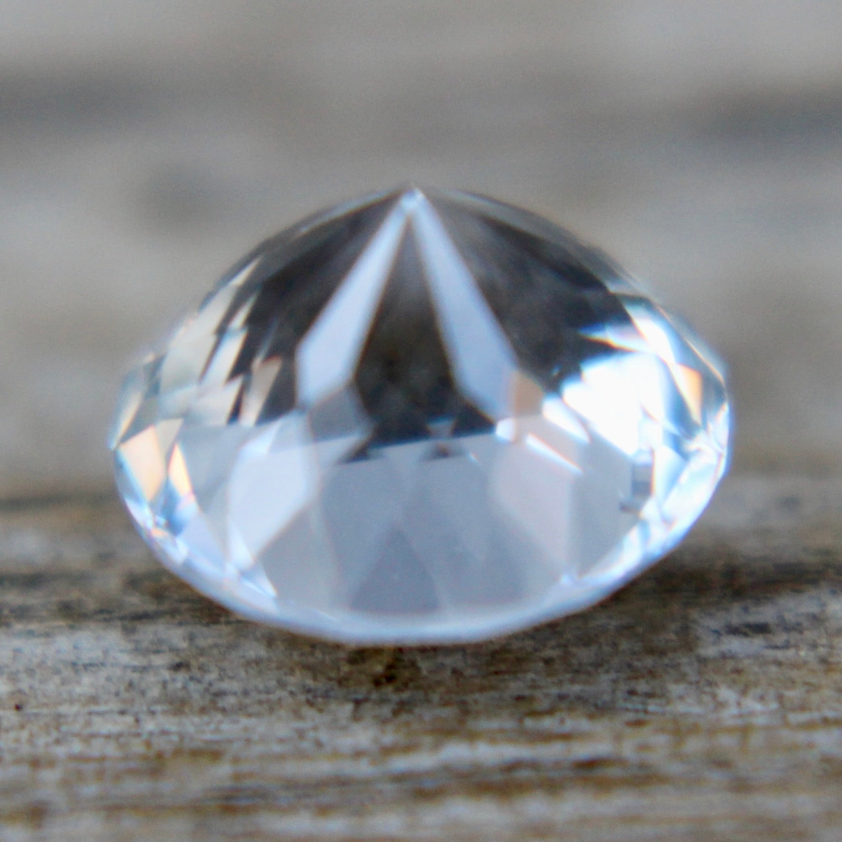 Unheated untreated white sapphire 1.45 carat round cut transparent gemstone