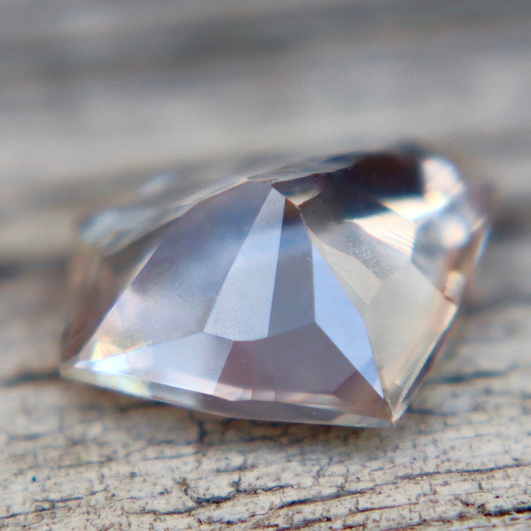 Natural White Sapphire with Soft Peach Undertone 1.85 Carat Freeform Cut from Ceylon - Sapphirepal