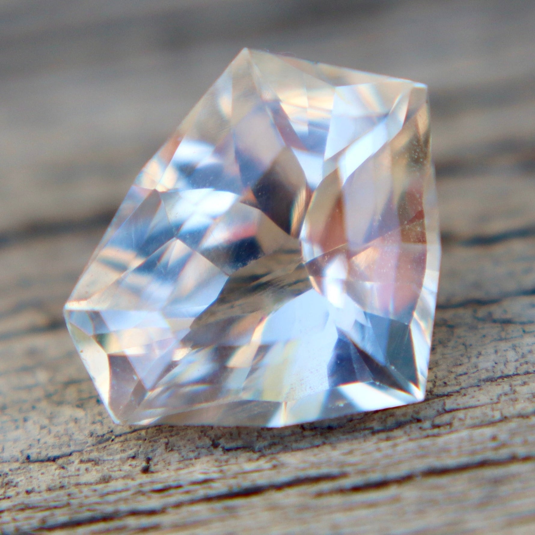 Natural White Sapphire with Soft Peach Undertone 1.85 Carat Freeform Cut from Ceylon - Sapphirepal