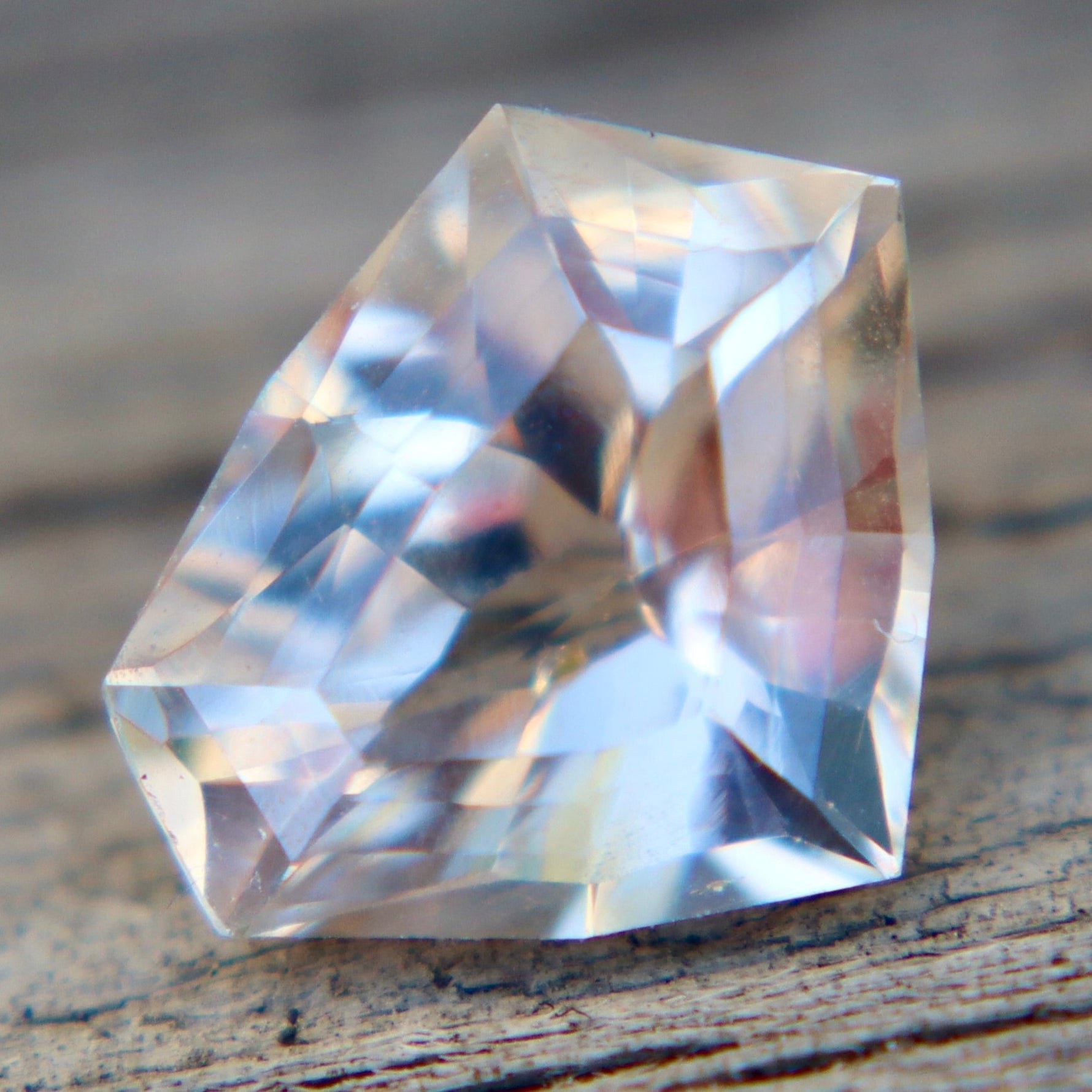 Natural White Sapphire with Soft Peach Undertone 1.85 Carat Freeform Cut from Ceylon - Sapphirepal
