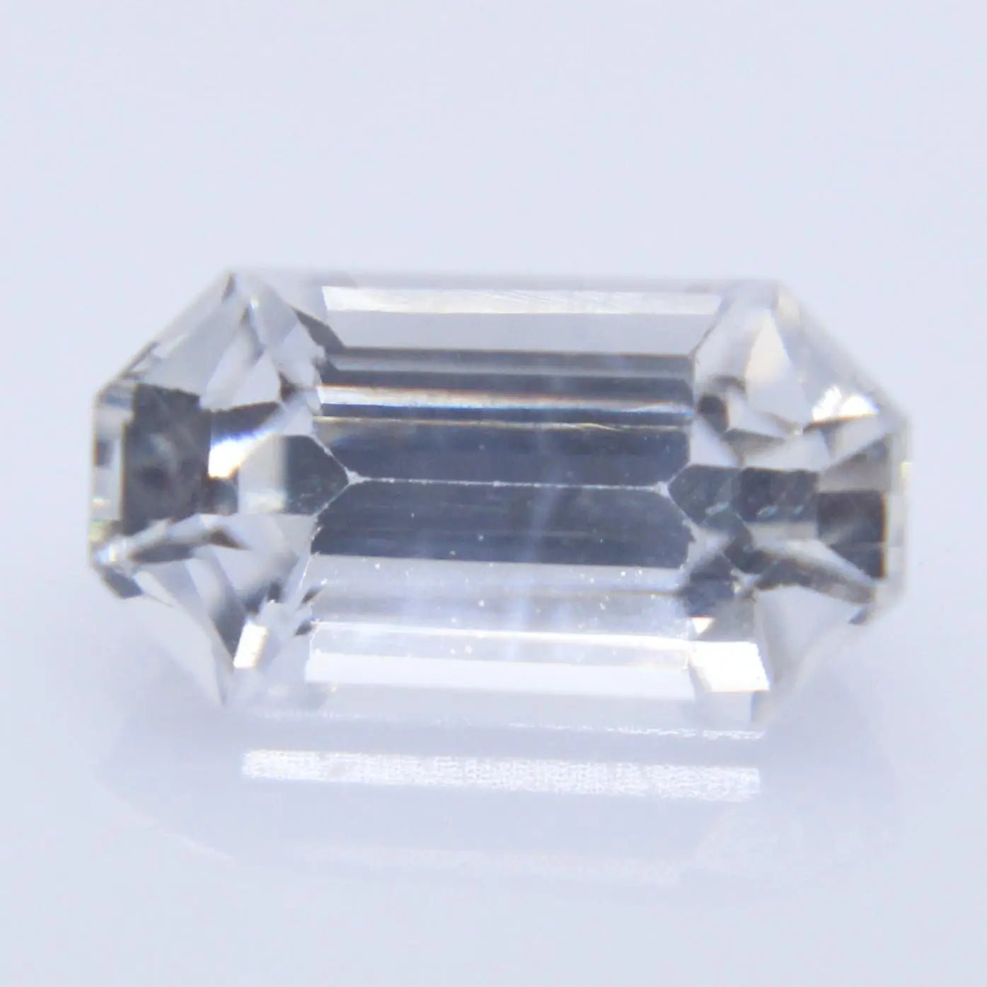 Natural white sapphire 0.52 carat emerald cut Ceylon loose gemstone VS clarity untreated