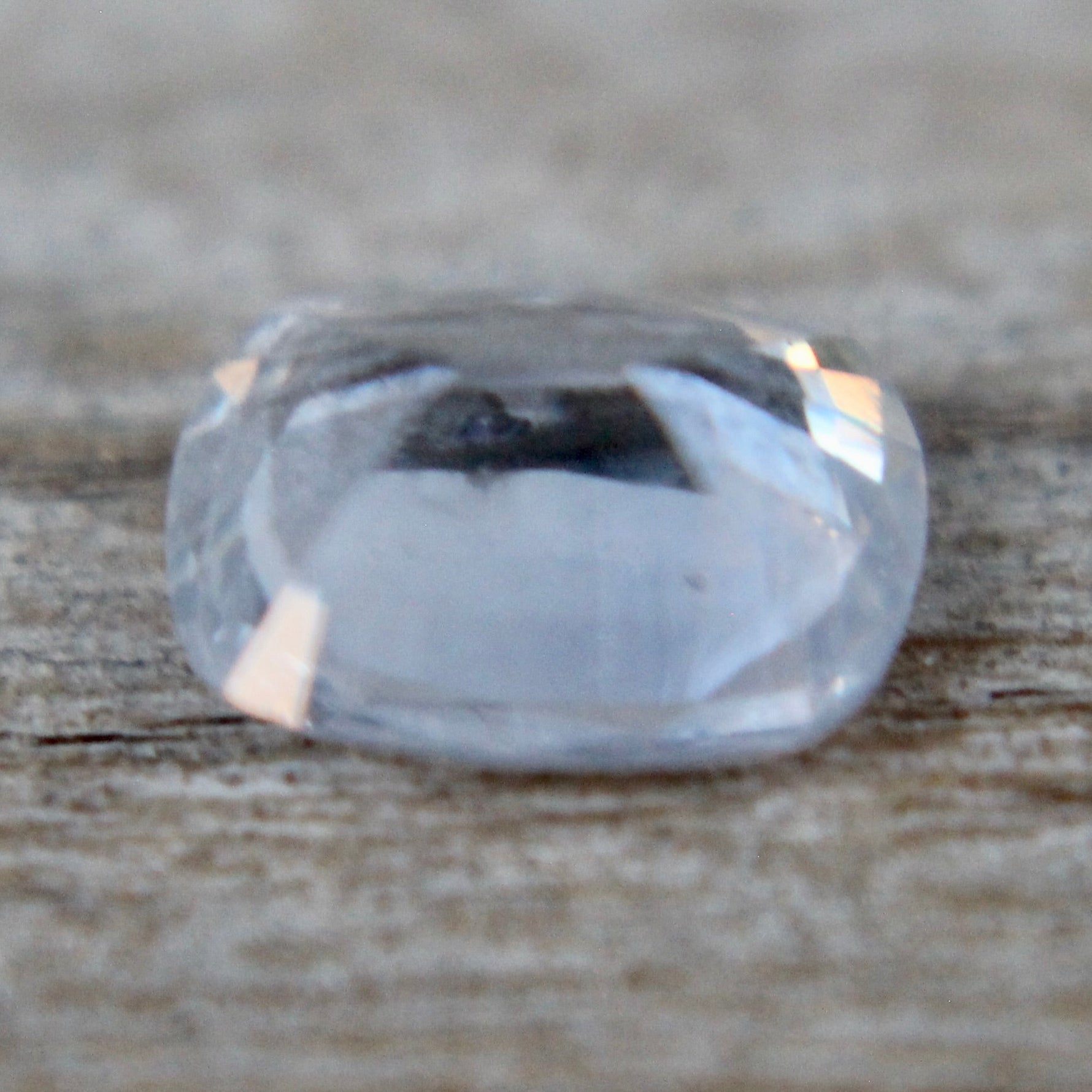 Colourless sapphire 6.70×5.12×3.14 mm – side profile