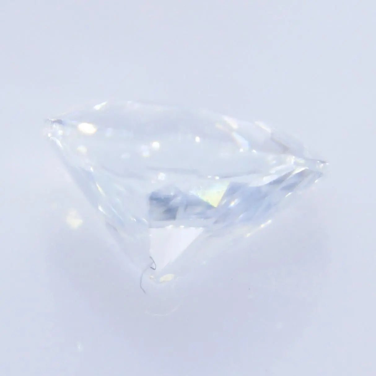natural white sapphire VS clarity trillion cut 0.5 carat faceted gemstone