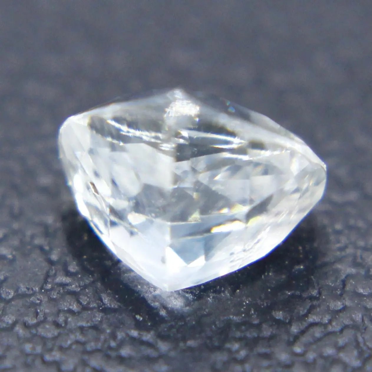 VS clarity colorless sapphire faceted trillion cut diamond alternative gemstone