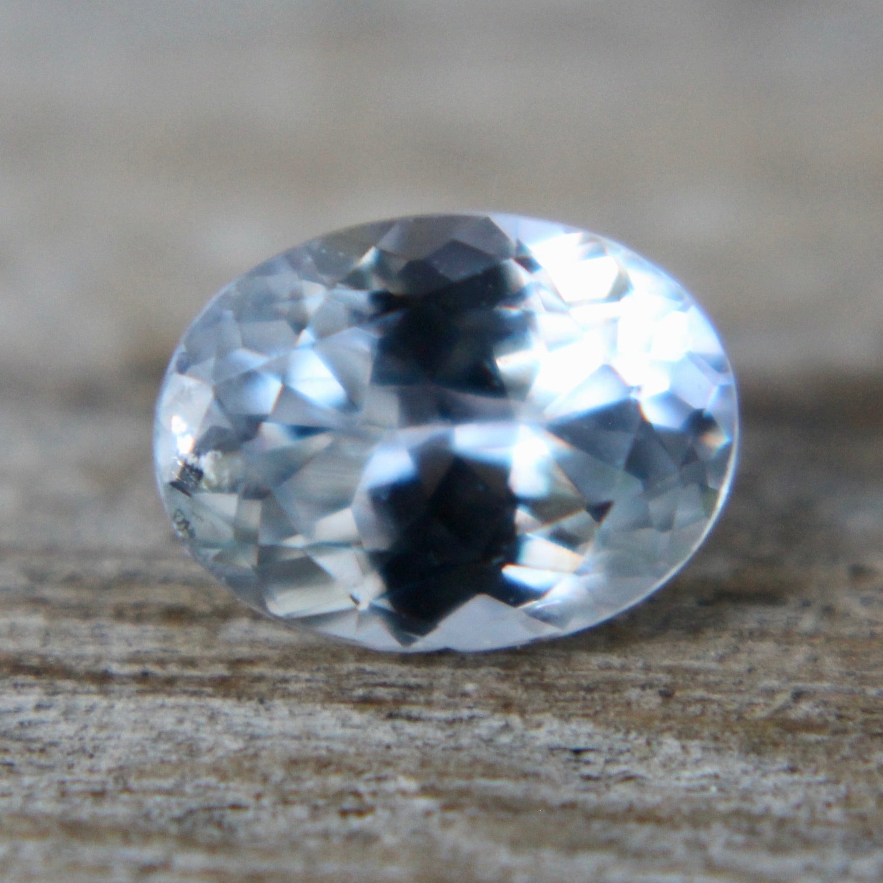 Ceylon white sapphire polished oval gemstone shipped from Australia