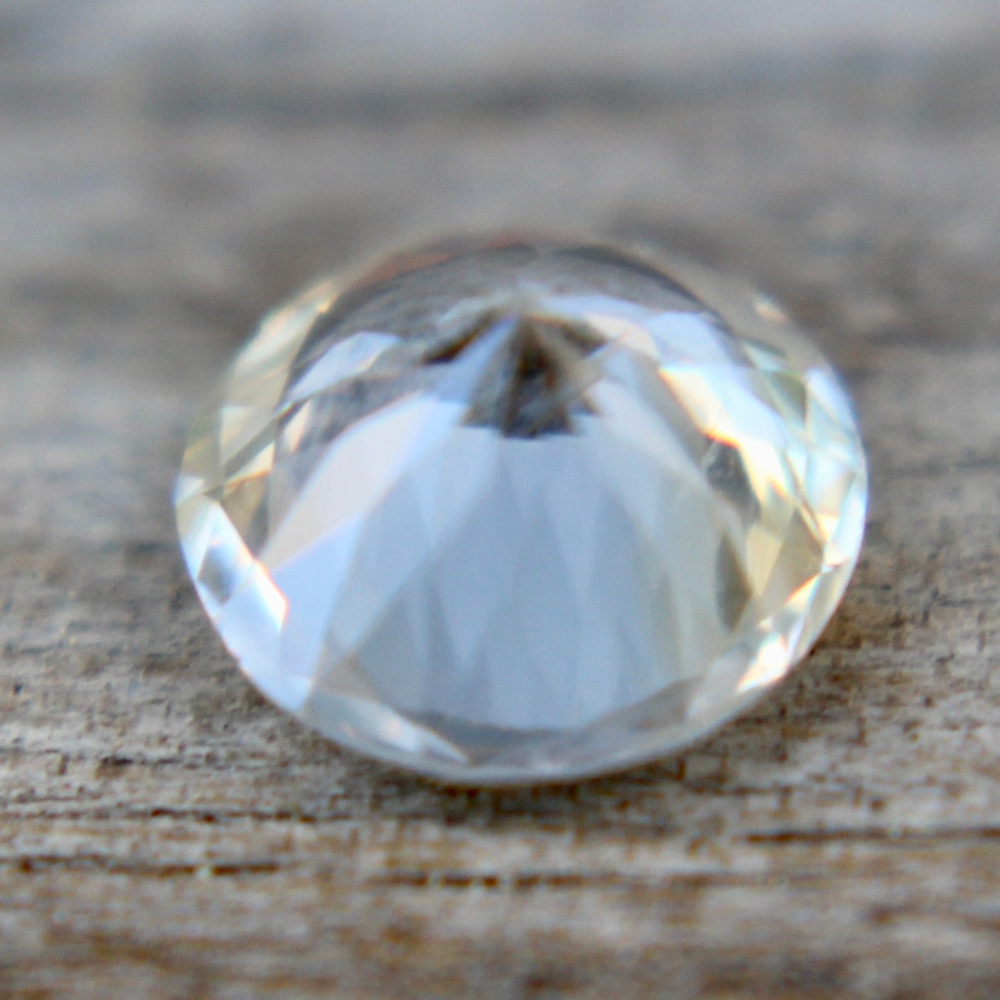 Earth-sourced Ceylon white sapphire – side angle showing brilliance