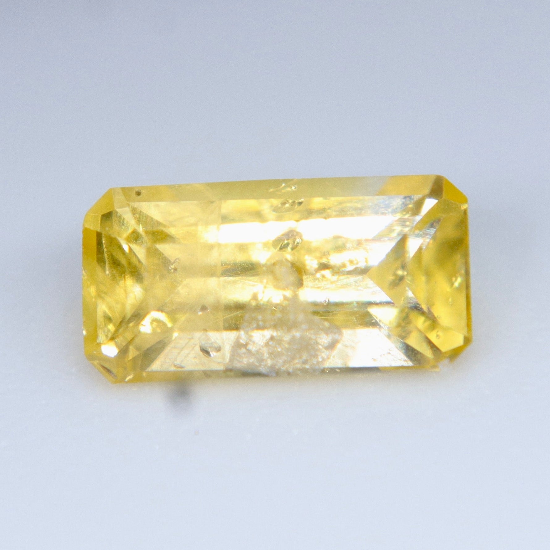 Natural Yellow Sapphire 0.57 Carat – Emerald Cut Unheated Ceylon Gemstone - Sapphirepal
