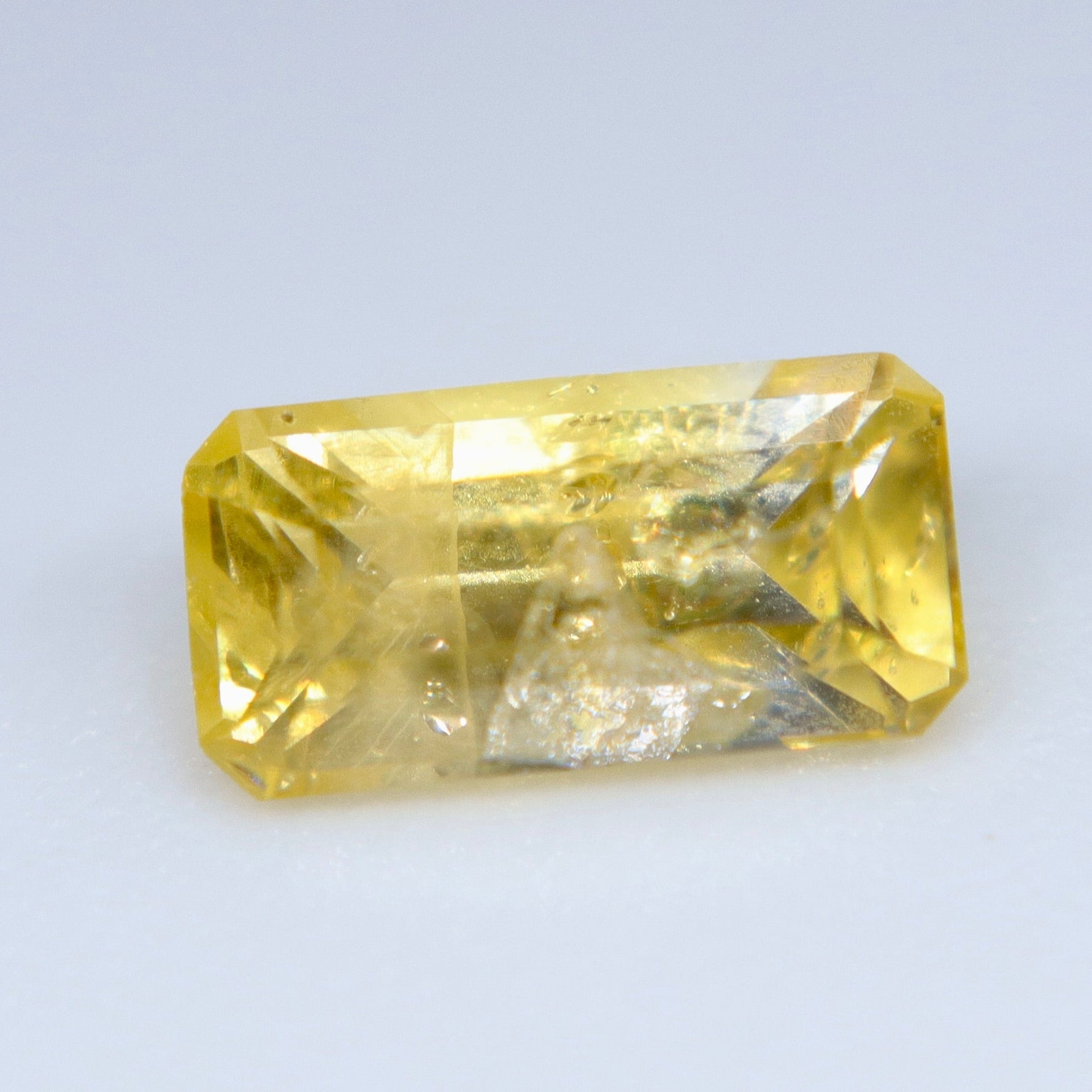 Natural Yellow Sapphire 0.57 Carat – Emerald Cut Unheated Ceylon Gemstone - Sapphirepal