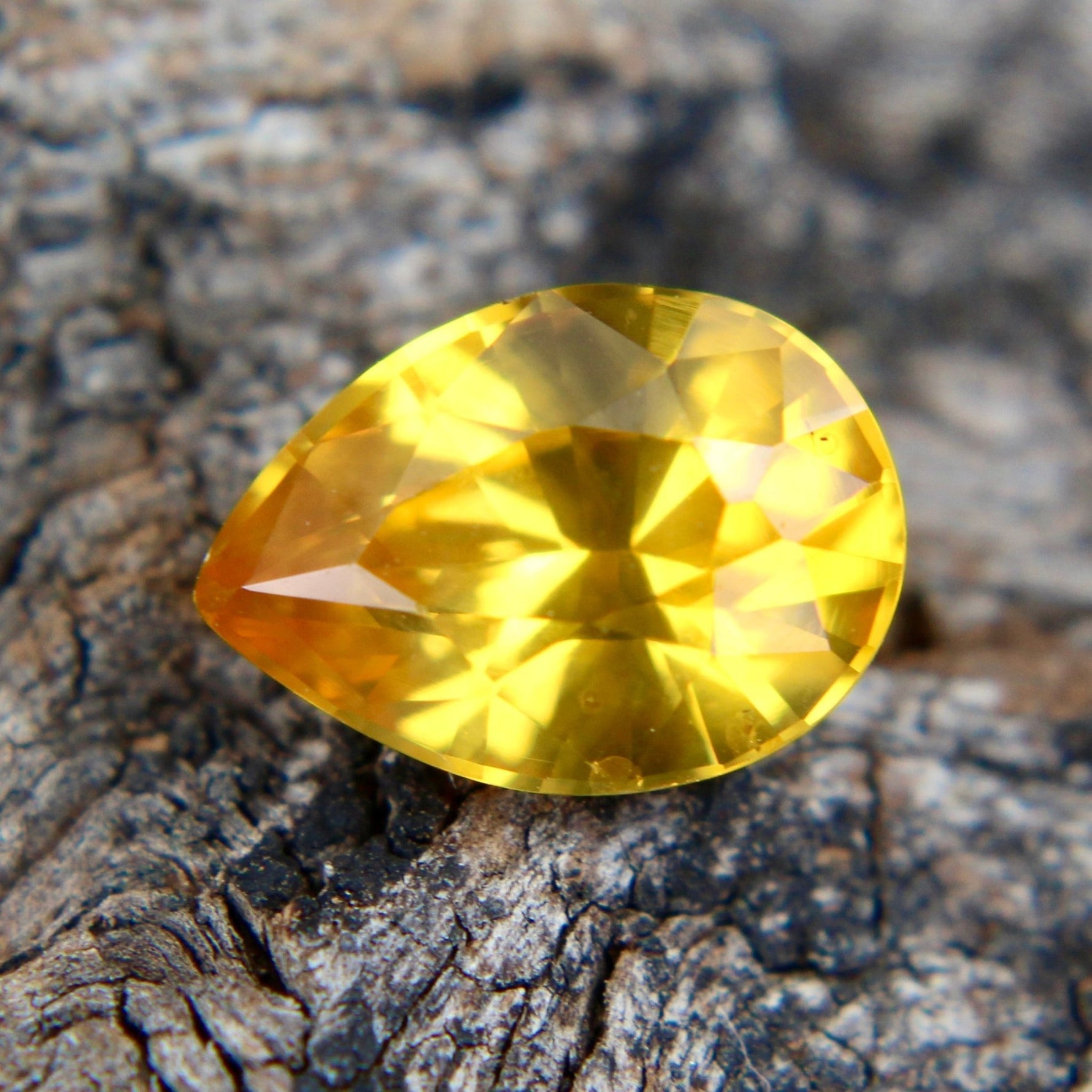 Natural yellow sapphire side profile showing approximately 3.74 mm depth