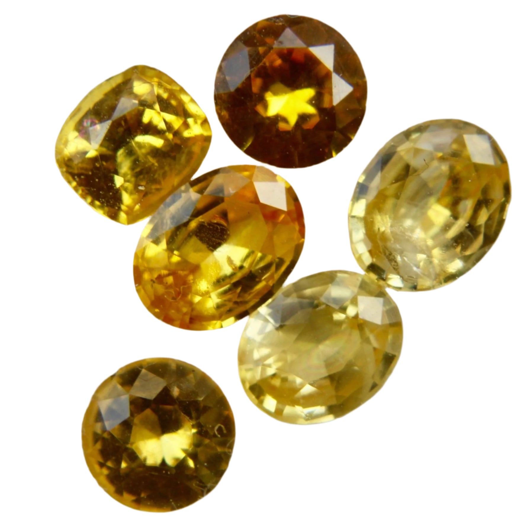 2.41ct natural yellow sapphire parcel from Ceylon – mixed oval, cushion, and round cuts. Eye clean clarity, vivid saturation. Ideal for jewellers, collectors, or bespoke jewellery designs.