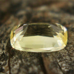 Ceylon yellow sapphire measured on calipers at 6.76 × 4.20 mm