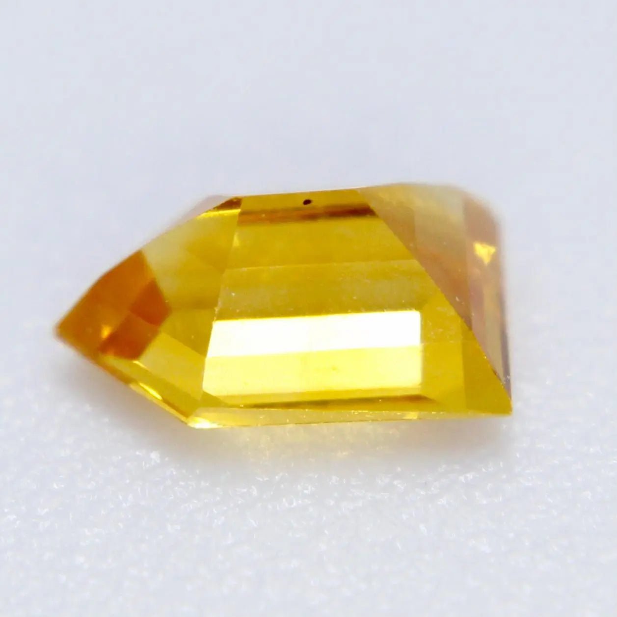 Yellow sapphire freeform cut faceted gemstone for custom jewelry design