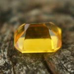 0.74ct Ceylon yellow sapphire, emerald cut, heated, VS clarity — macro under daylight
