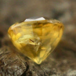 Side profile of round yellow sapphire showing 4.37 mm depth