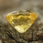Heated yellow sapphire 5.86×4.73×3.92 mm – side profile