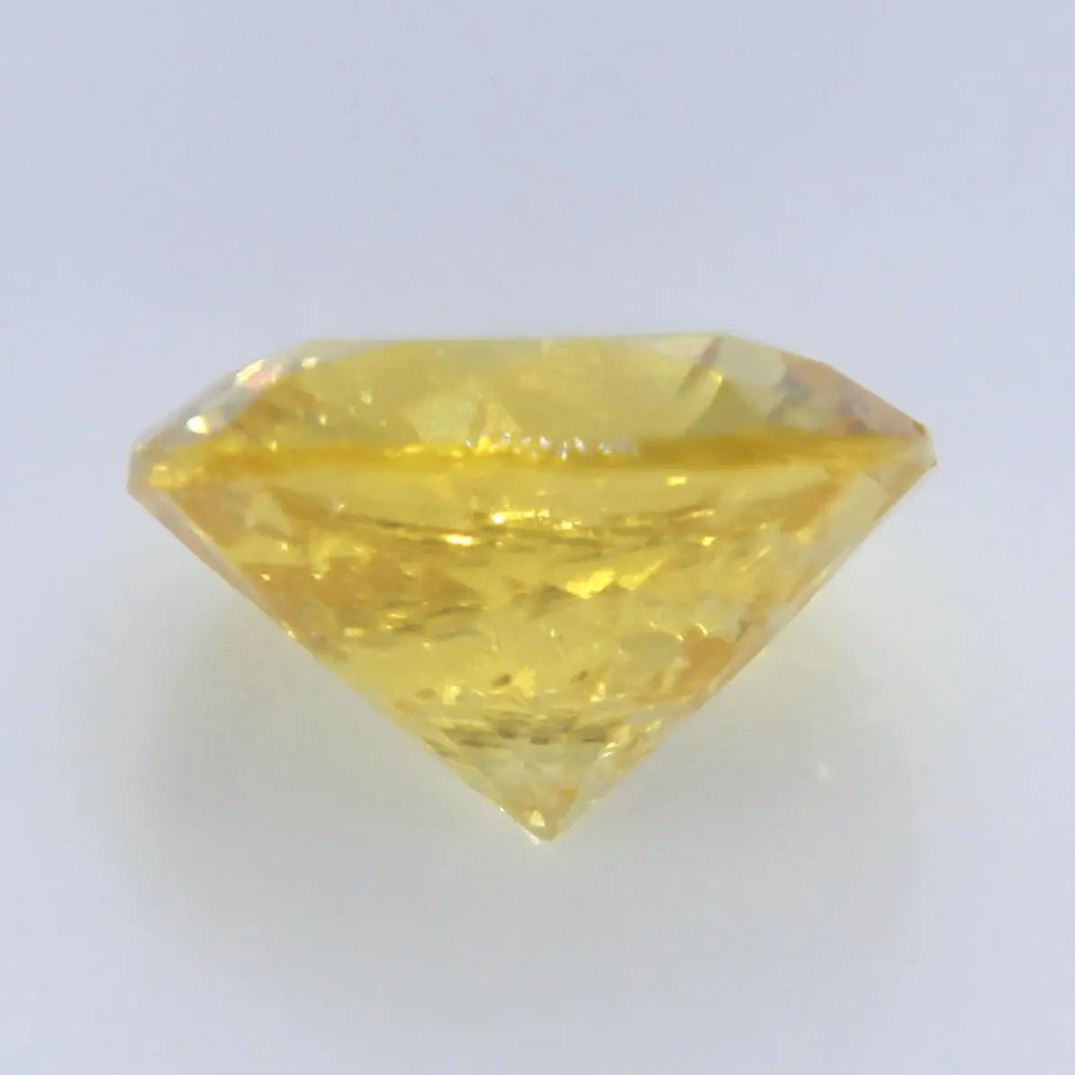 Faceted Round Cut Ceylon Sapphire 0.71 Carat Bright Yellow Gem