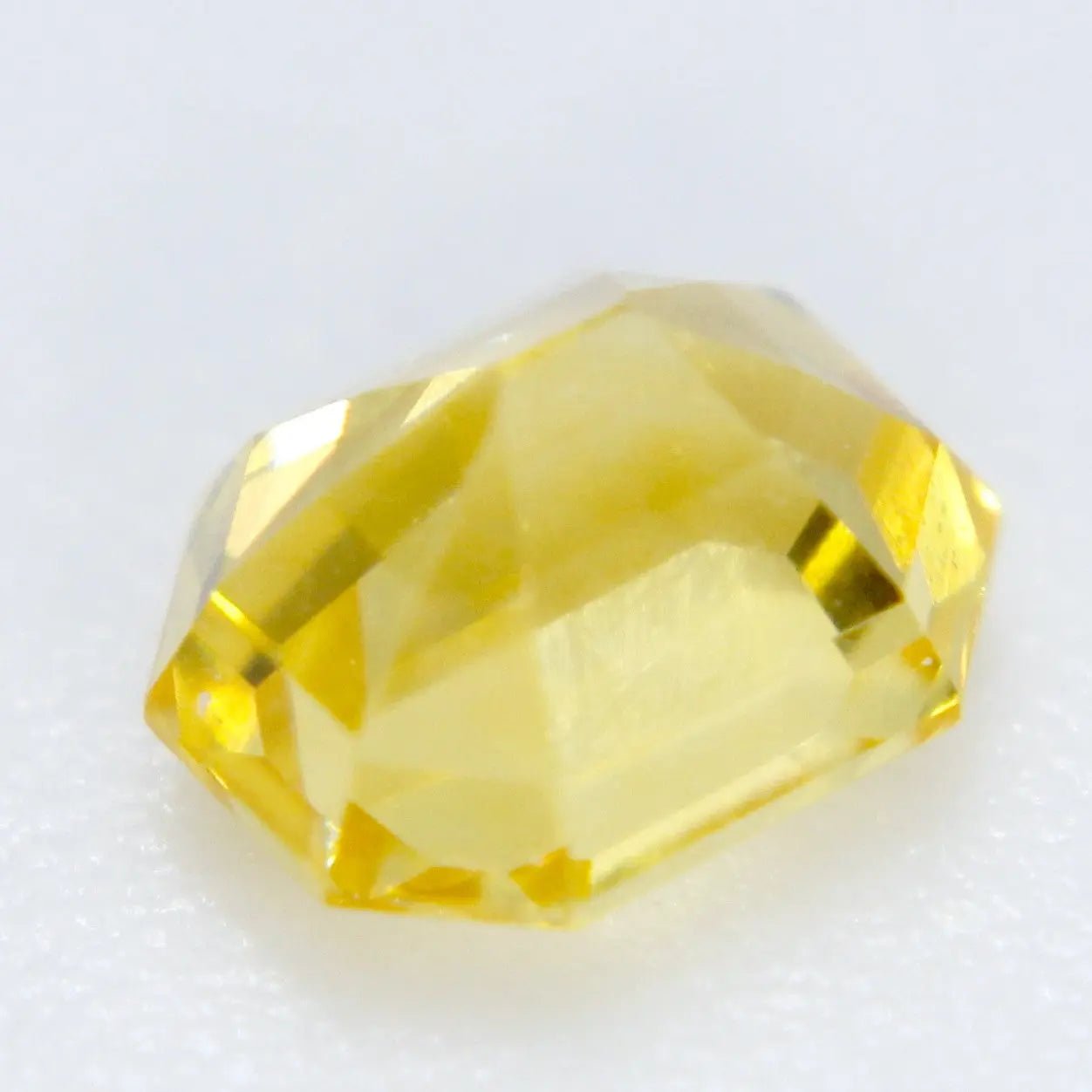 Golden yellow sapphire emerald cut VS clarity Sri Lanka origin