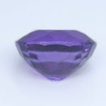 Close-up of the table and crown facets of an oval amethyst