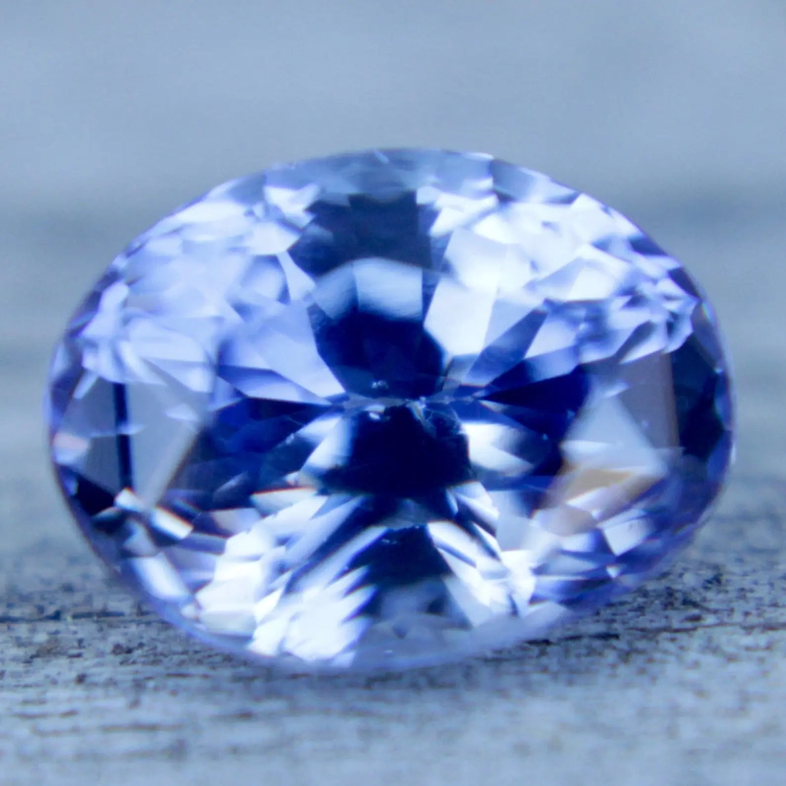 Faceted oval blue sapphire loose stone for engagement ring or pendant design