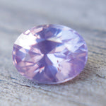 Oval pink-purple sapphire for custom fine jewelry design