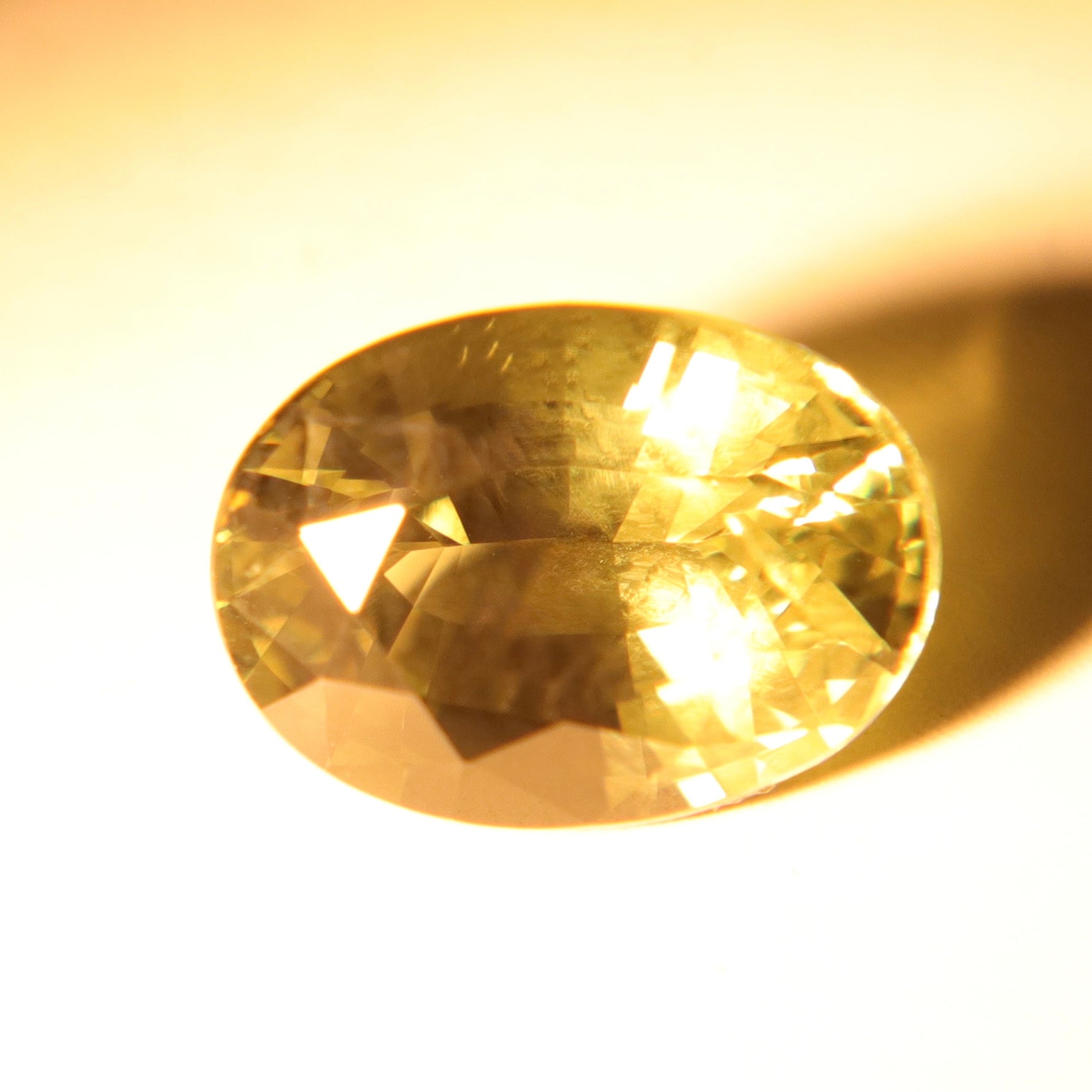 Side view of 1.63 carat oval vanadium chrysoberyl loose gemstone