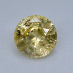 Pale lemon-yellow Ceylon sapphire photographed in natural daylight