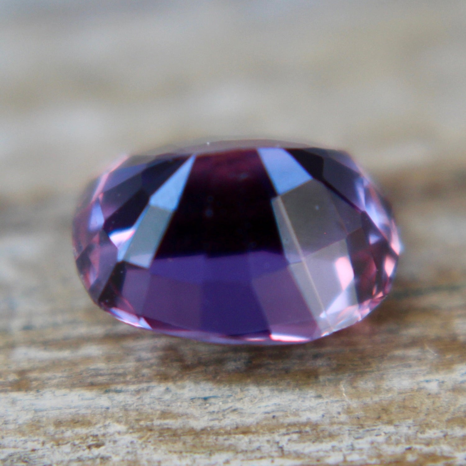 Angled view of a 1.50 carat natural purple Ceylon sapphire