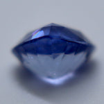Natural purple sapphire measuring approximately 6.30 by 4.00 mm