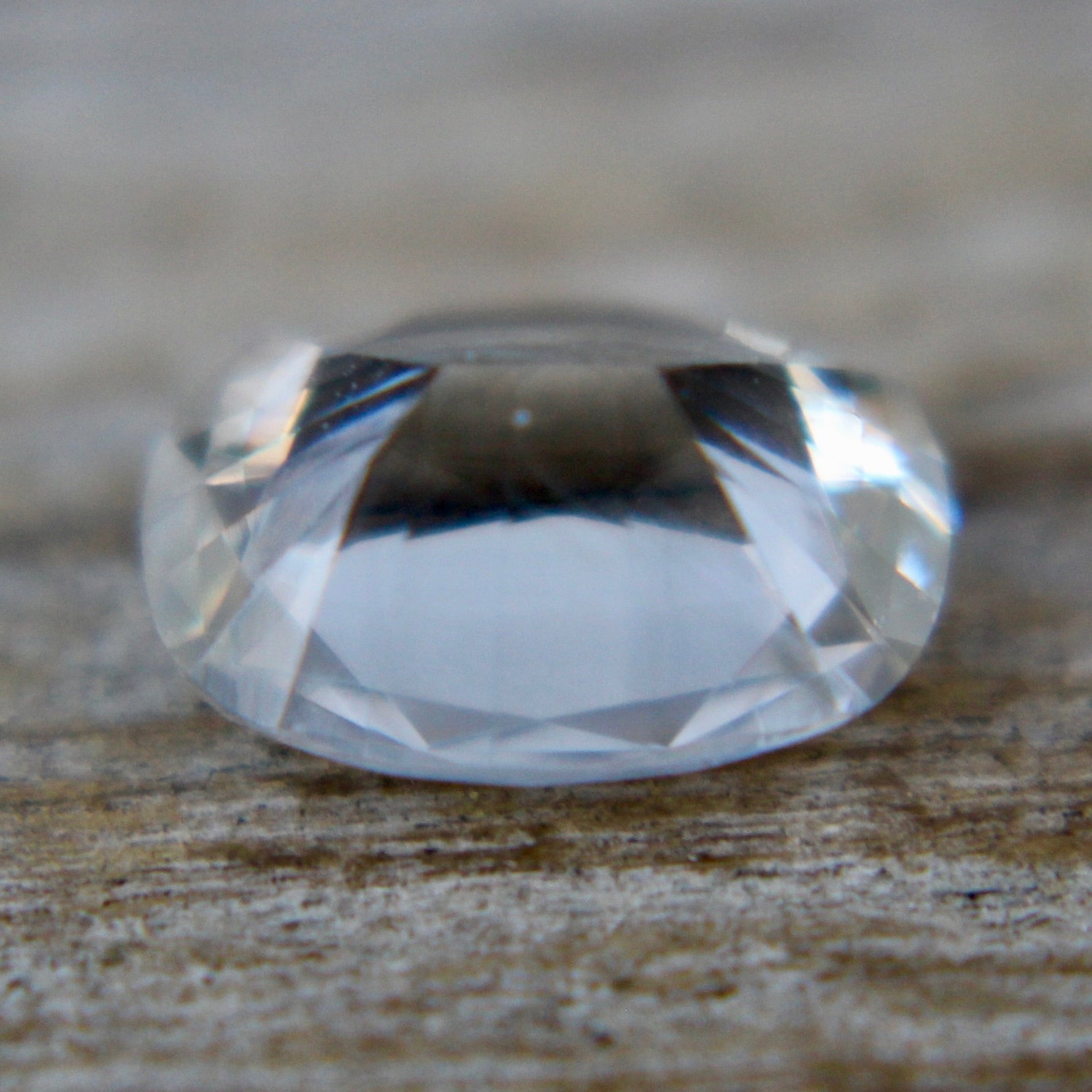 Unheated Ceylon white sapphire showing elongated cushion-cut facets