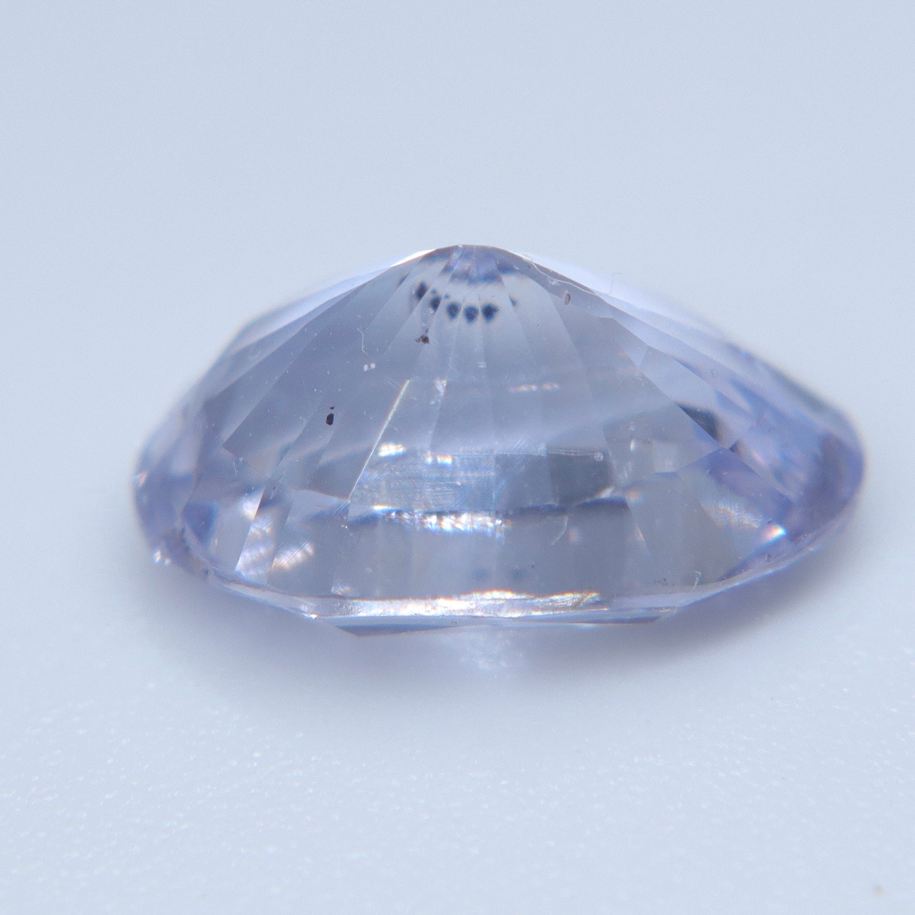 Unheated lavender Ceylon sapphire weighing 2.98 carats with natural inclusions