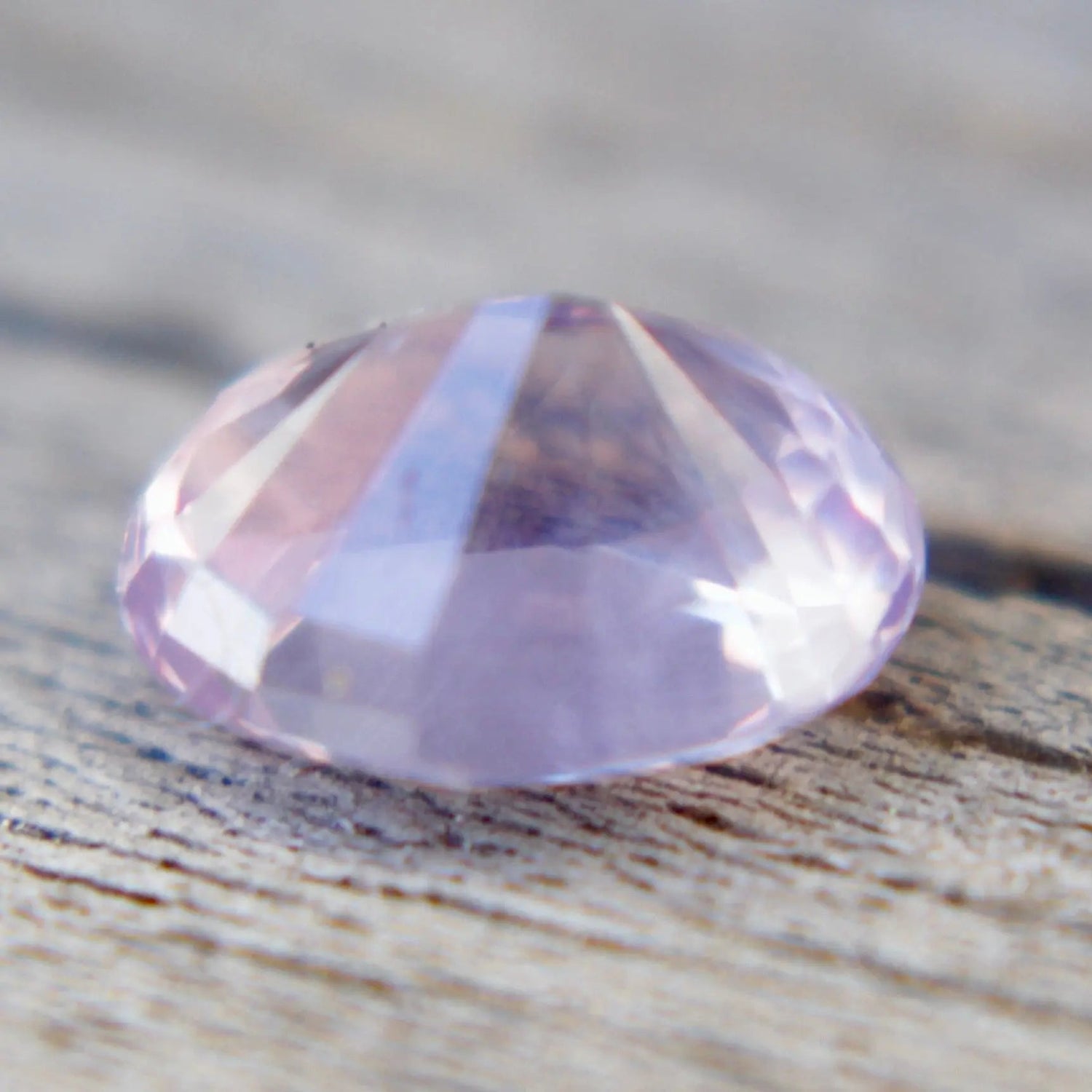 Unheated Ceylon pink sapphire measuring 6.35 by 5.02 mm
