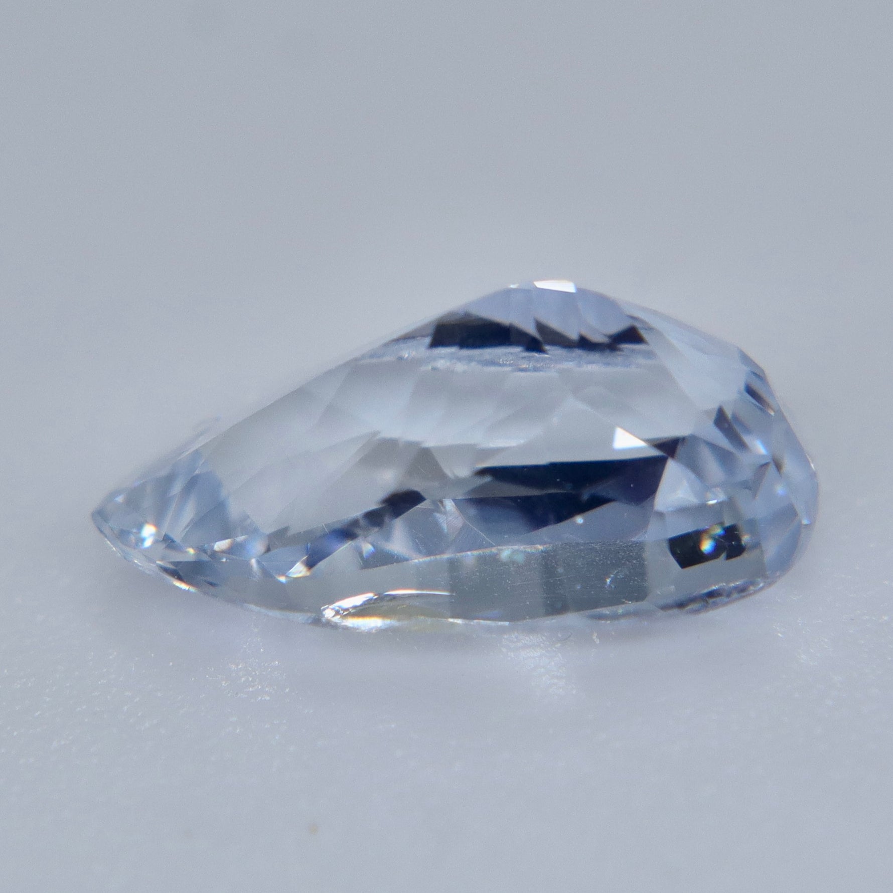 Alt: Side profile of untreated 2.70ct white sapphire showing its 5.14 mm depth