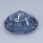 Side profile of untreated 1.17ct natural purple spinel showing oval facets and 4.73 mm depth