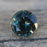 Untreated natural green sapphire 1.35 carat round cut with VS clarity