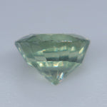 Untreated round-cut green sapphire from Madagascar showing soft mint and yellow-green tones
