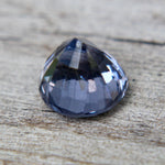 Face-up view of untreated 1.50 carat round purple spinel gemstone
