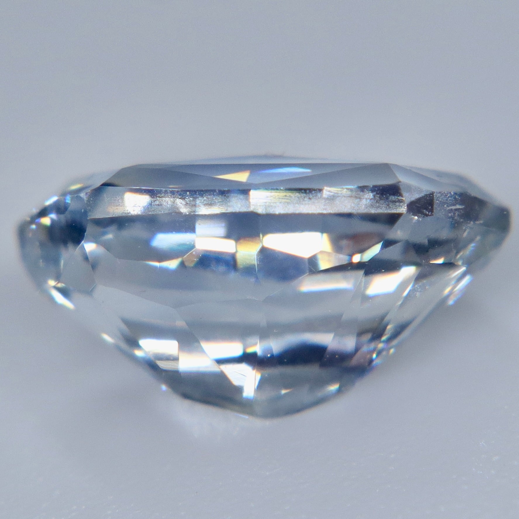 Side profile of an untreated 3.24 carat white Ceylon sapphire