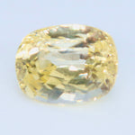 Yellow sapphire viewed from above, showing its rectangular outline and rounded corners